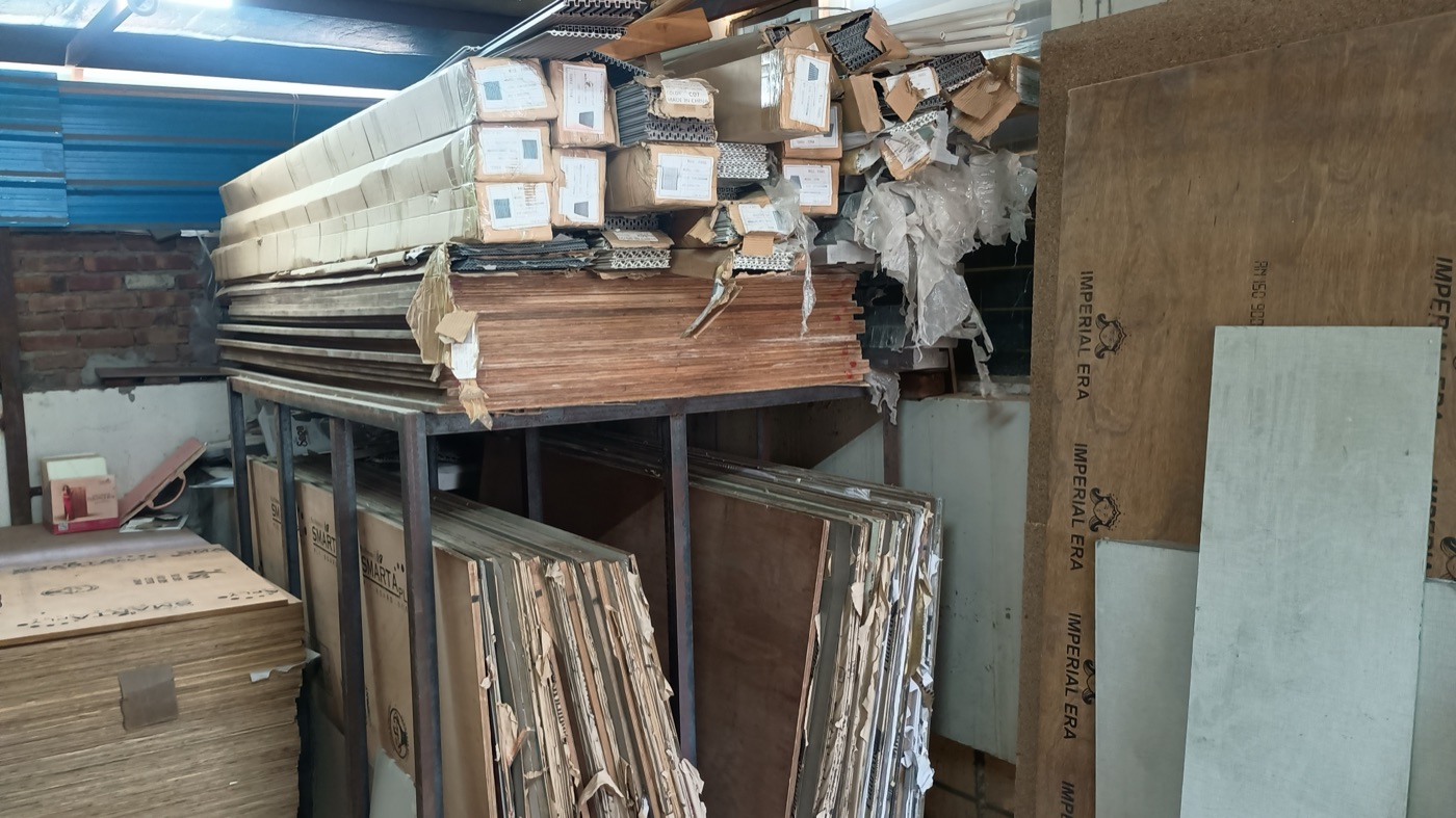 Boards stacked floor-to-ceiling